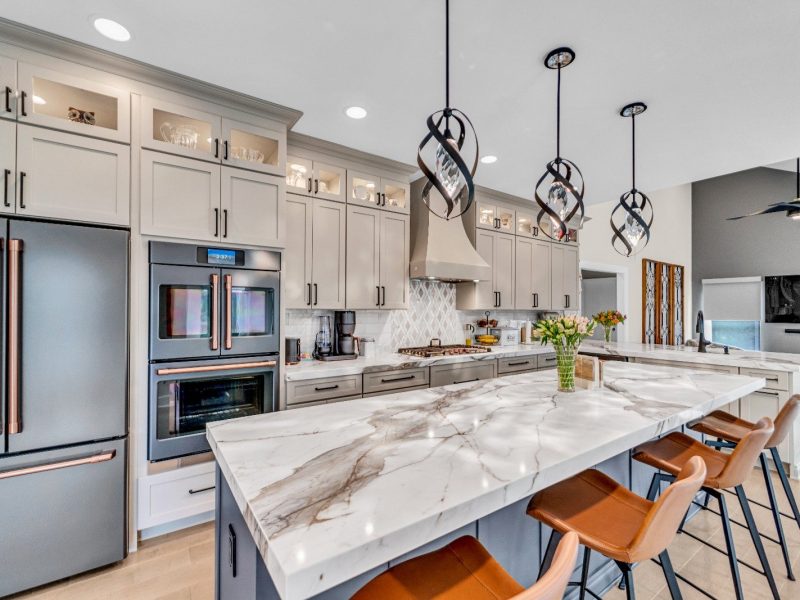 Custom cabinetry installation in a South Jersey kitchen — shaker doors with brass hardware