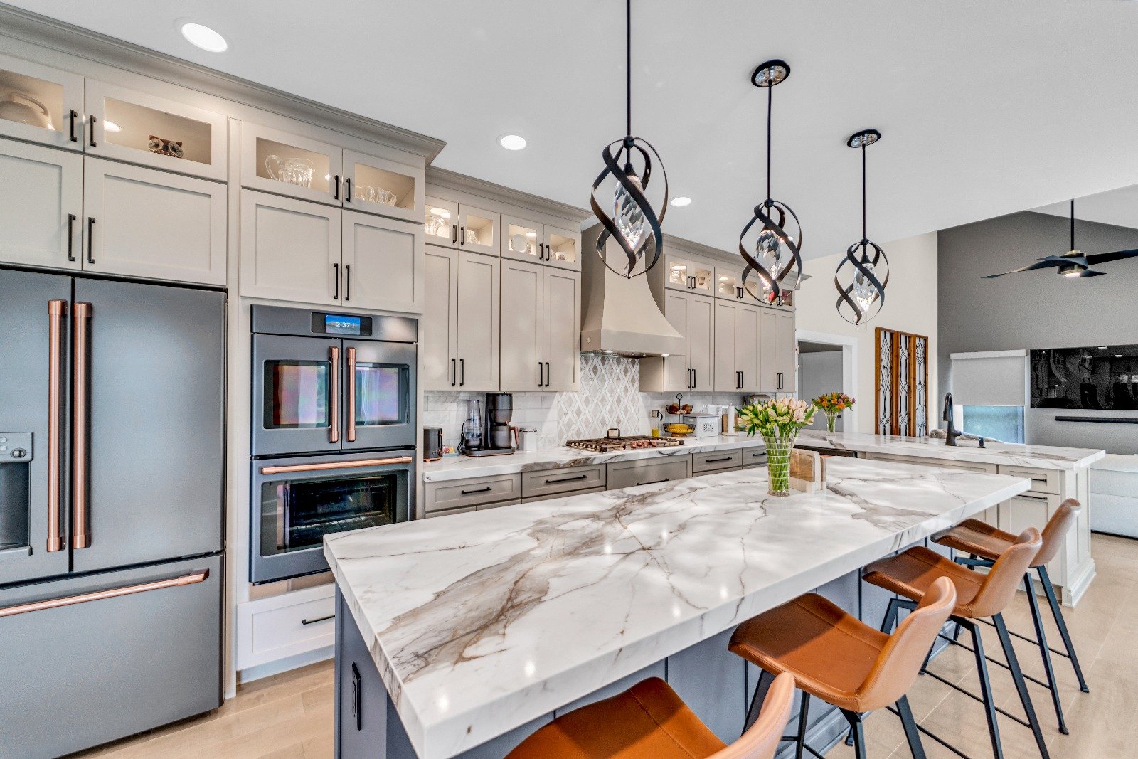 Custom cabinetry installation in a South Jersey kitchen — shaker doors with brass hardware