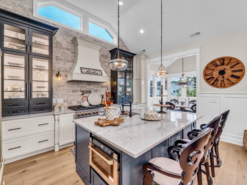 Custom kitchen remodel by Kitch Designs in Cherry Hill, NJ — two-tone cabinetry, quartz island and pendant lighting